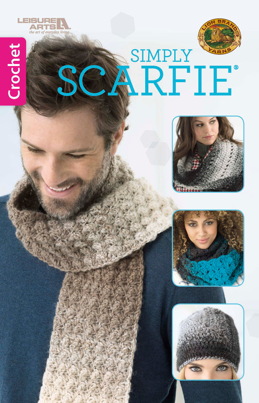 The cover of "Simply Scarfie Crochet" by Leisure Arts shows a smiling man in a beige scarf, plus three images of women modeling beginner crochet patterns made with Lion Brand Scarfie yarn.