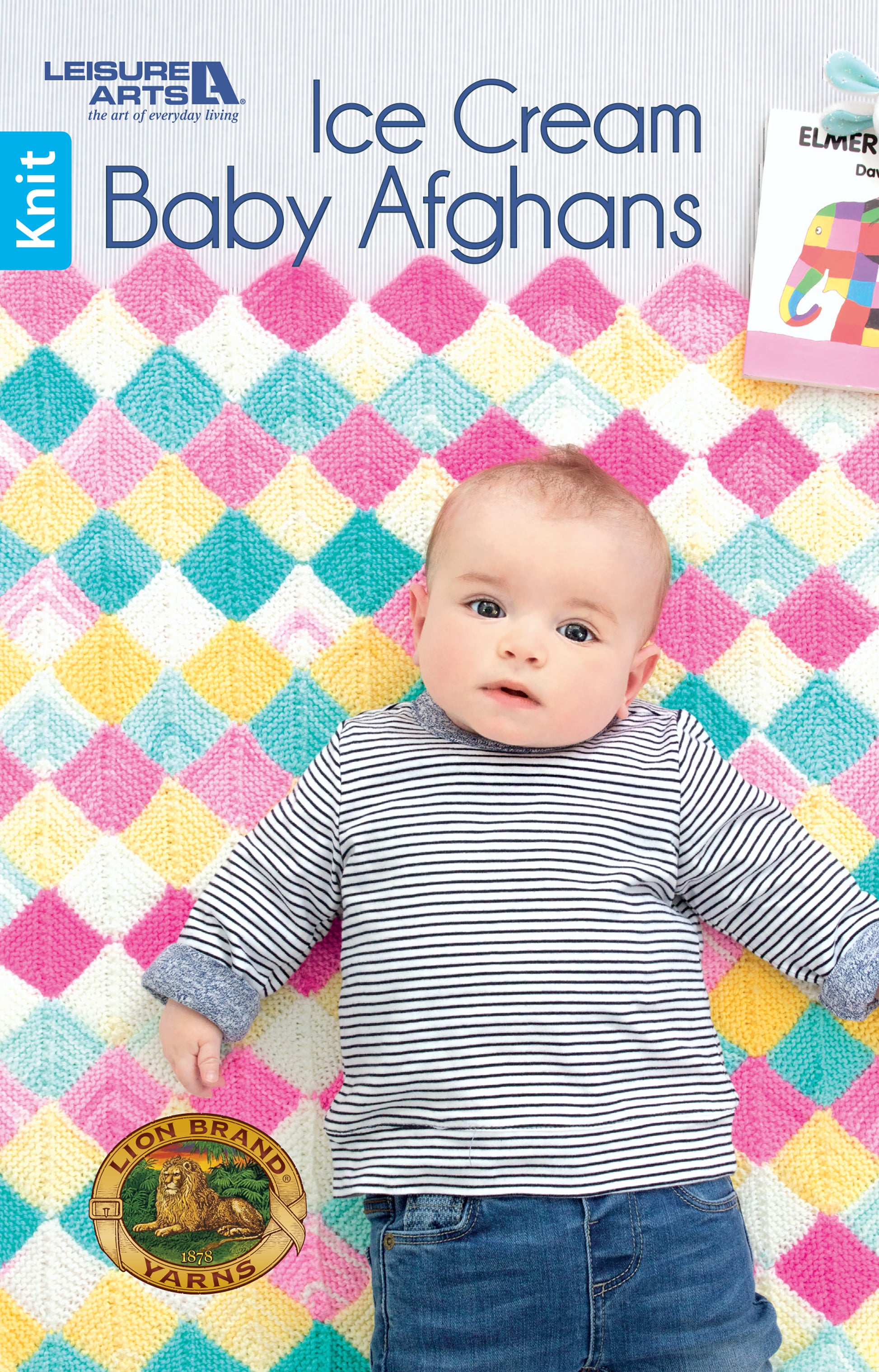 A baby in a striped shirt lies on a colorful, diamond-patterned afghan. Text reads: Ice Cream Baby Afghans Digital Download by Leisure Arts.