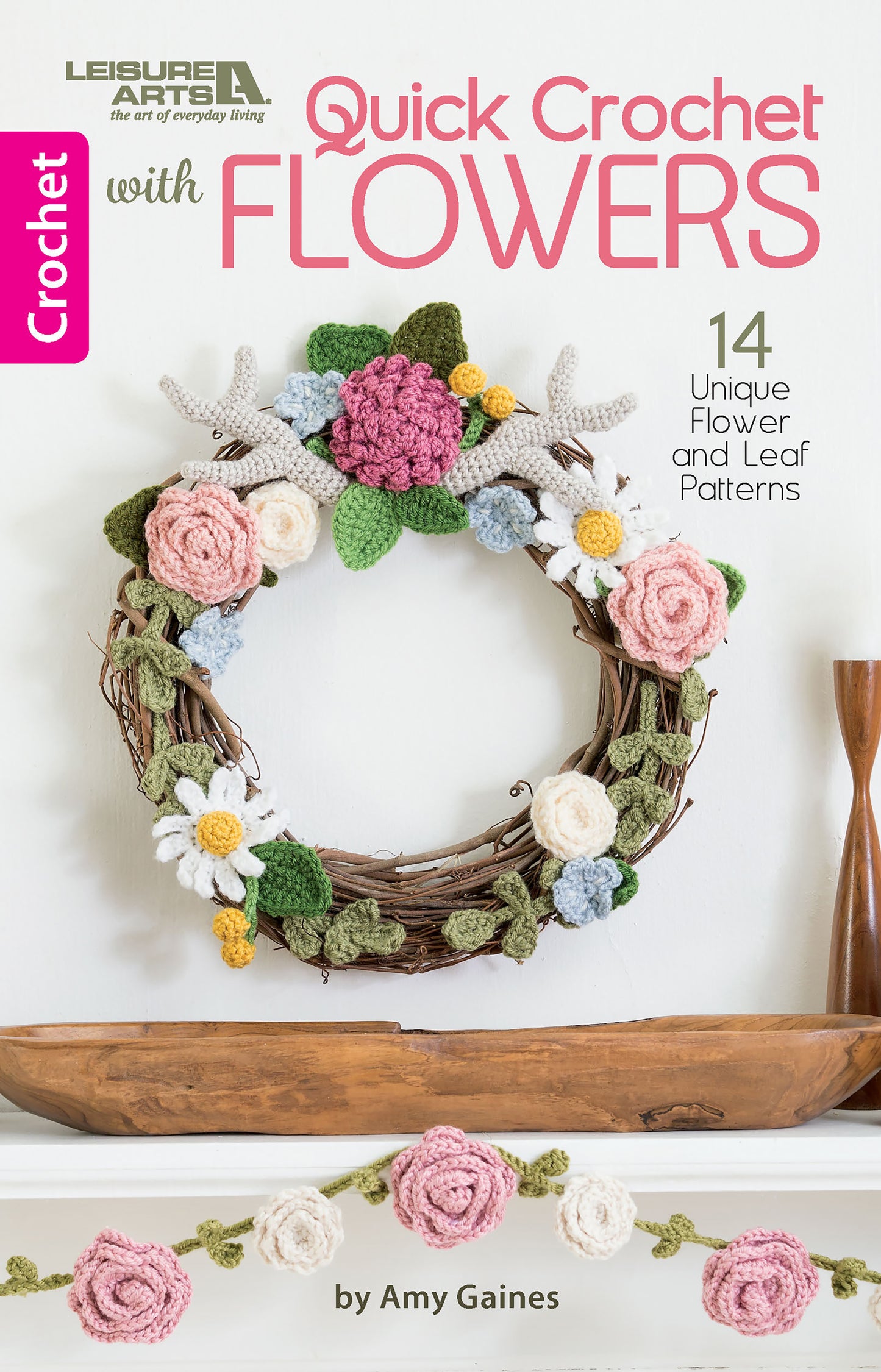 Cover of Quick Crochet With Flowers from Leisure Arts. Showcases a grapevine wreath with colorful crocheted flowers and wall hangings. Includes 14 flower and leaf patterns designed for medium weight yarn.