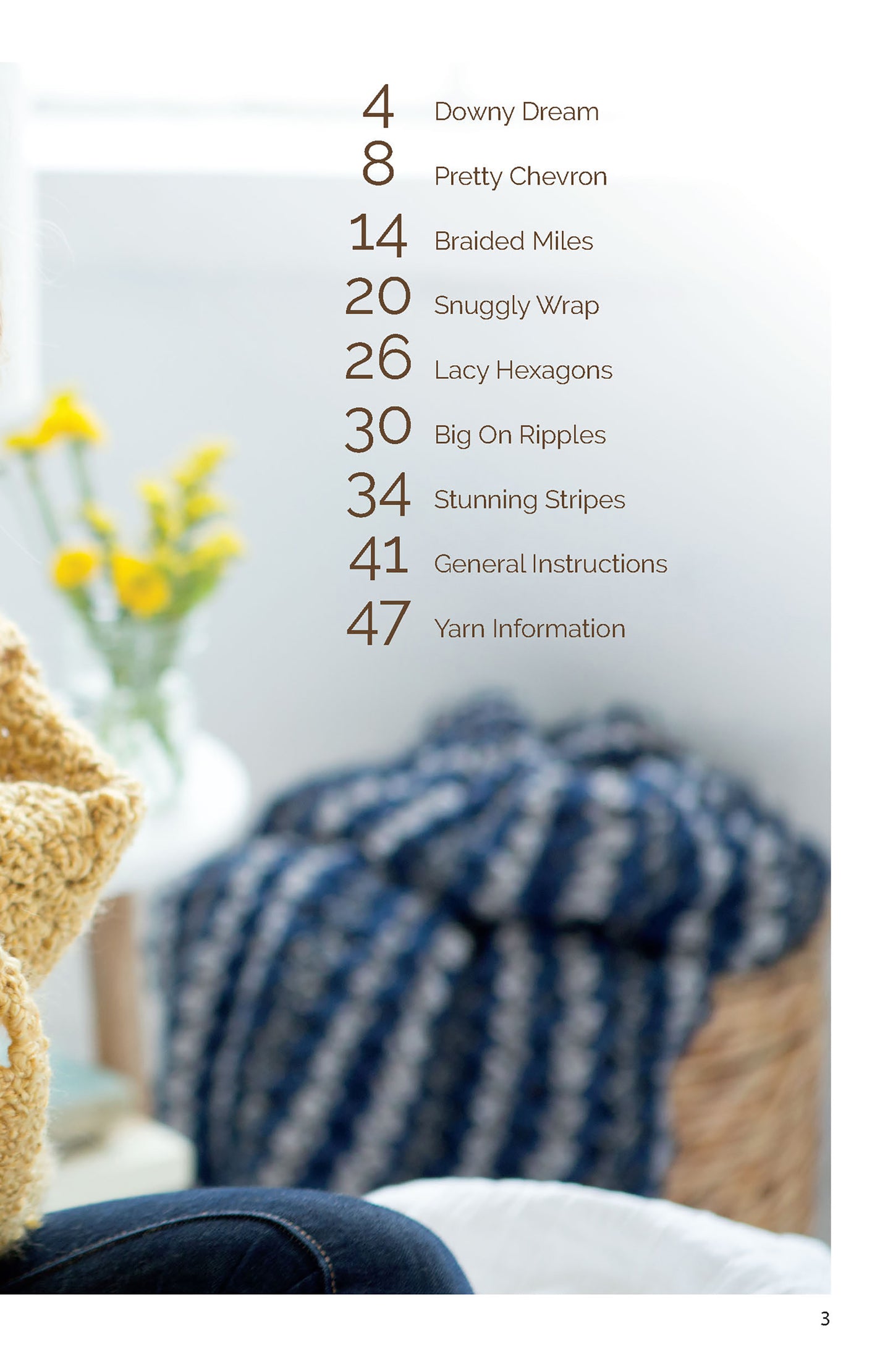 A table of contents is overlaid on a cozy scene with a person holding a yellow knit, yellow flowers, and a basket with a blue-and-white blanket—ideal inspiration from Leisure Arts’ Homespun Comfort Afghans.