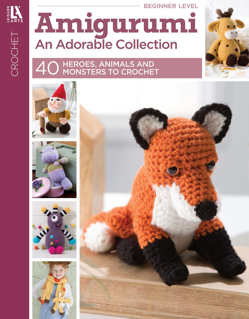 Cover of "Amigurumi An Adorable Collection" by Leisure Arts, featuring a crocheted fox centerpiece and smaller images of cute crochet patterns including a giraffe, gnome, cow, and baby with teddy bear.