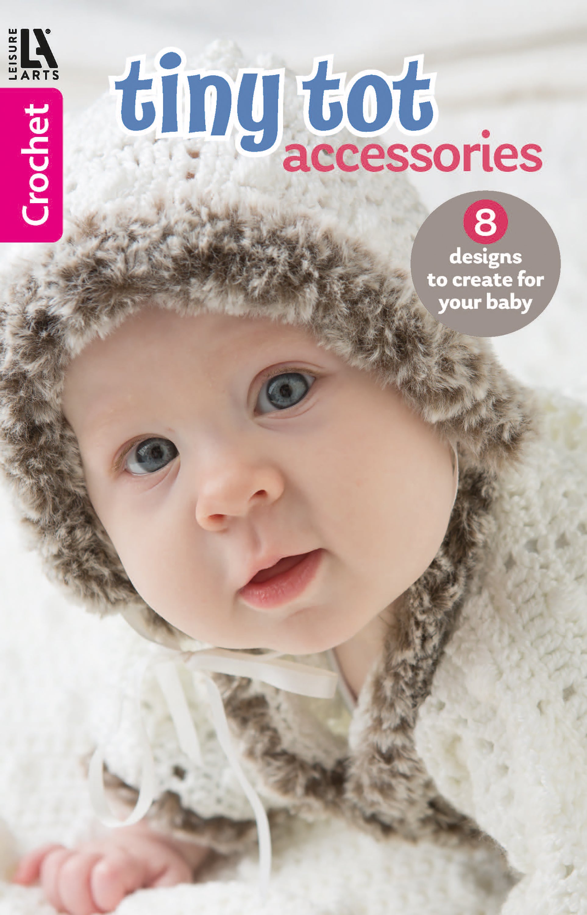 A baby in a soft crochet hat and sweater gazes up with blue eyes. The Leisure Arts magazine cover reads, "Crochet Tiny Tot Accessories: 8 easy baby projects," with a pink Crochet sidebar on the left.
