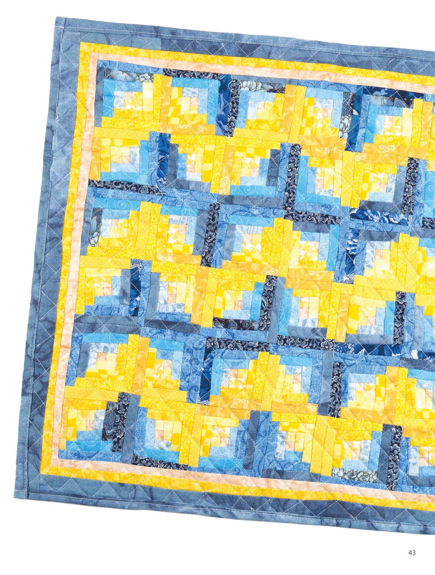 The "Miniature Quilts—12 Tiny Projects That Make a Big Impression" by Leisure Arts features expert quilting in blue and yellow geometric patterns, perfect for home decor or gifting. Shown angled on a white background.