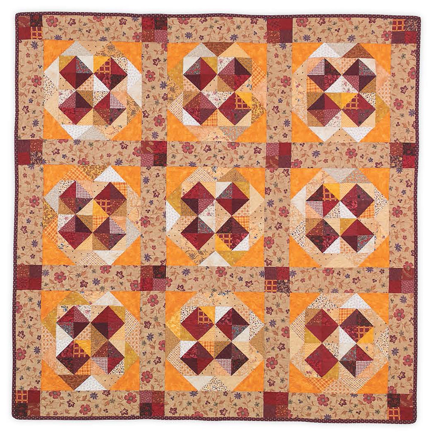 The Leisure Arts "It's Quilt Magic" digital download features nine heart-shaped patchwork blocks in red, yellow, and cream with classic patterns, a floral border, and red edge—a cozy design ideal for beginner quilters.