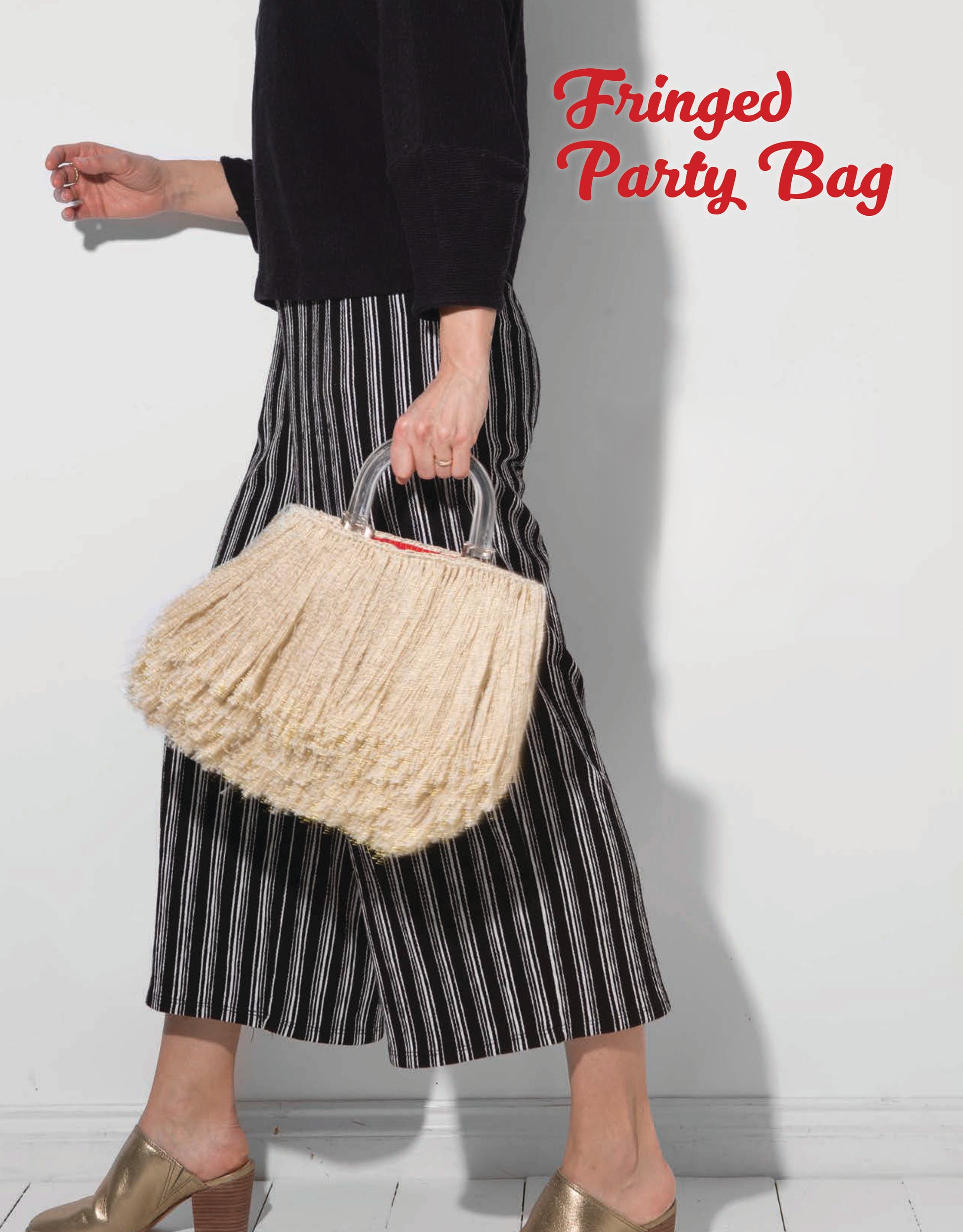 A person in a black top and striped culottes holds Leisure Arts’ Latch Hook—12 Projects for the Modern Maker Digital Download—a chic statement piece. They wear gold heels. Red text reads: Latch Hook—12 Projects.