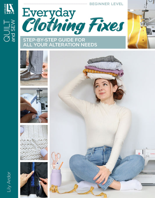 The Everyday Clothing Fixes book cover from Leisure Arts shows a smiling woman balancing folded clothes on her head, sitting cross-legged, with images around her illustrating hemming pants, sewing buttons, and other useful clothing repairs.