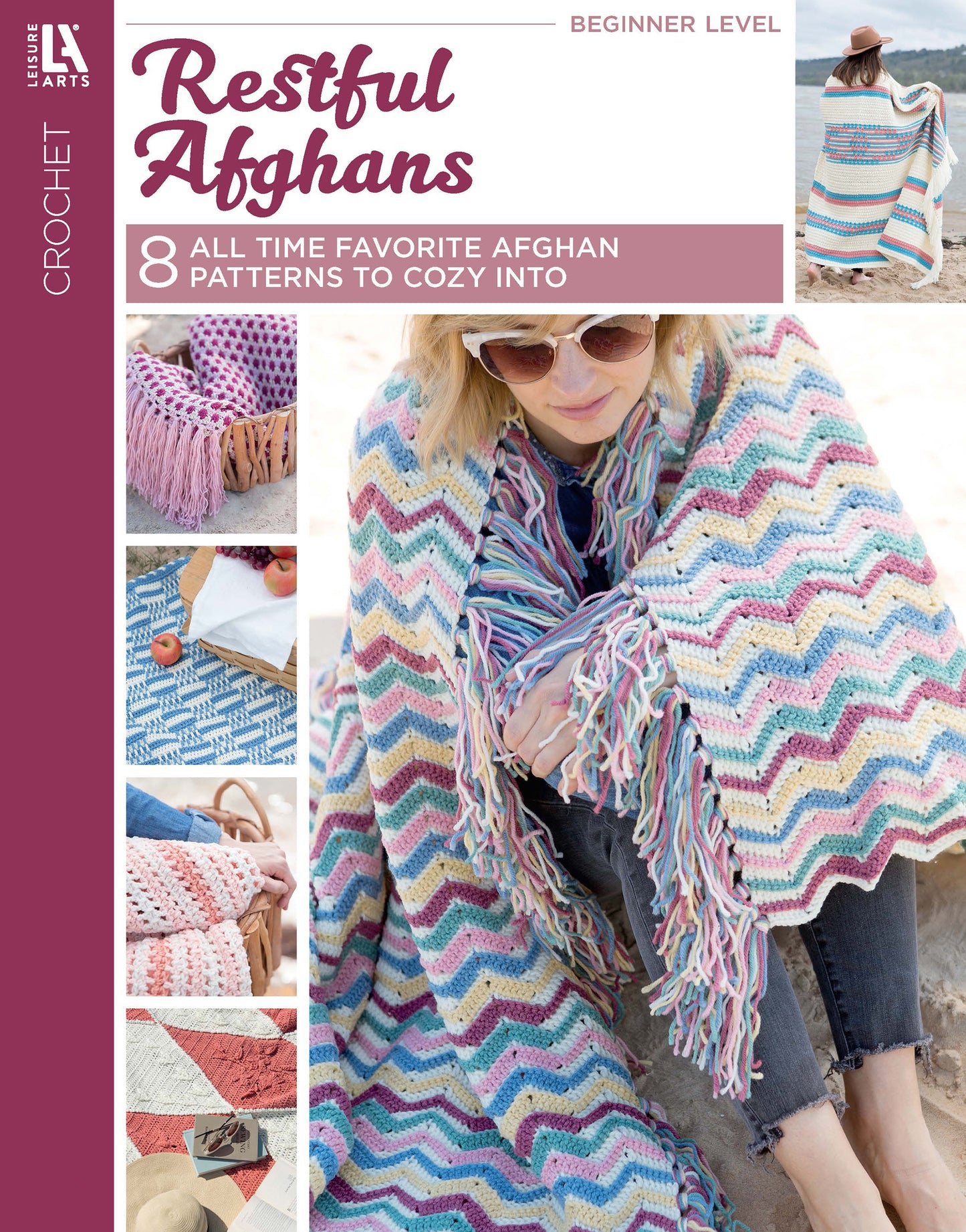 A woman wearing sunglasses sits outdoors wrapped in a vibrant crochet blanket. The cover reads Restful Afghans Crochet by Leisure Arts, featuring 8 favorite afghan patterns to cozy into, all made with medium weight yarn.
