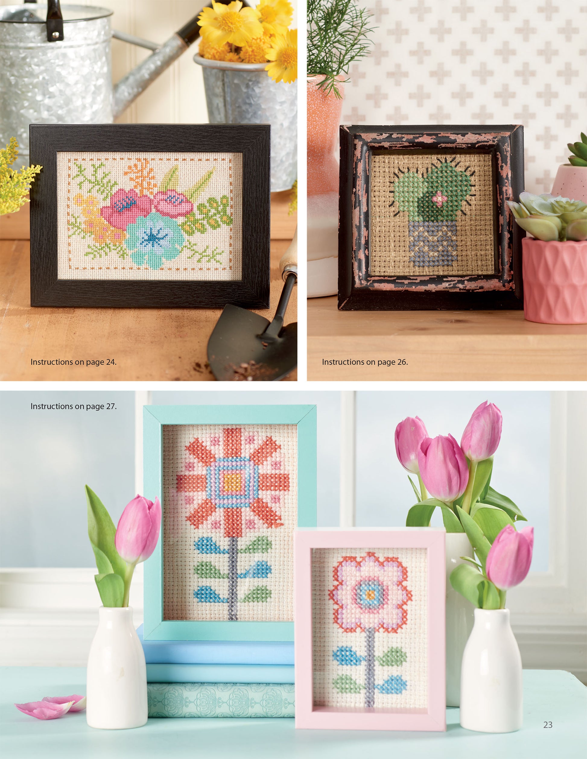Four “From the Garden Cross Stitch” artworks by Leisure Arts, with vibrant floral and cactus designs, are displayed among vases of tulips and decorative items—perfect for adding a charming accent to your home decor.