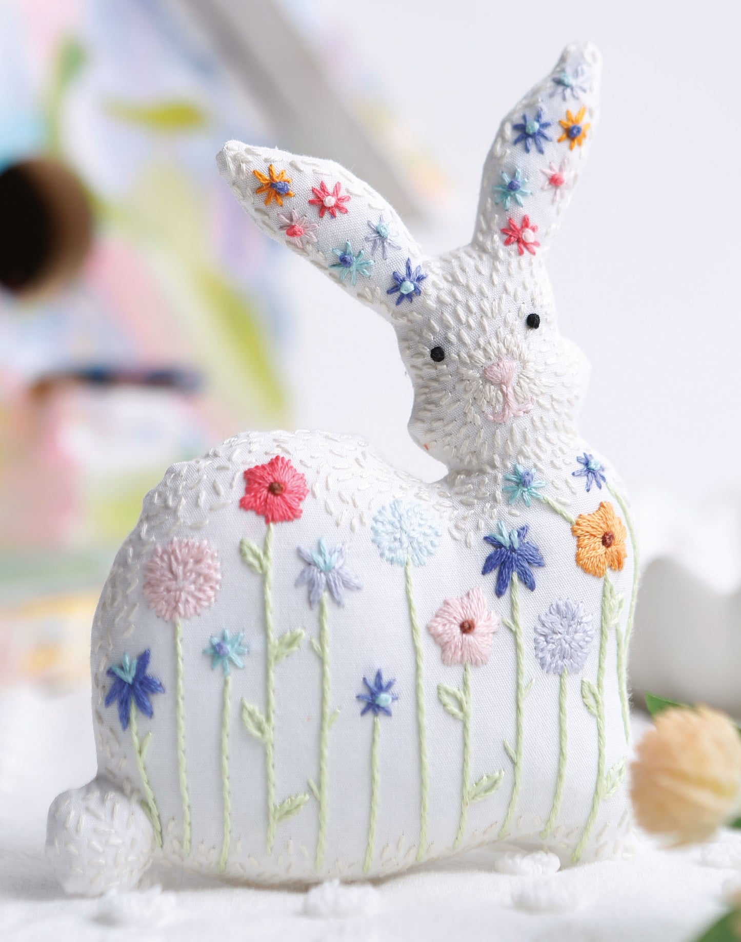 Displayed on a white surface, Forest Friends—12 Adorable Animals to Embroider by Hand Digital Download from Leisure Arts features charming animal designs, perfect for inspiring intermediate embroidery projects and creative patterns.