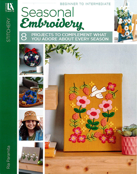 Cover of Leisure Arts' Seasonal Embroidery—8 Projects to Complement What You Adore About Every Season, showing vibrant embroidered flowers, leaves, and a bird on yellow fabric, plus images of seasonal home décor projects for beginners and intermediates.