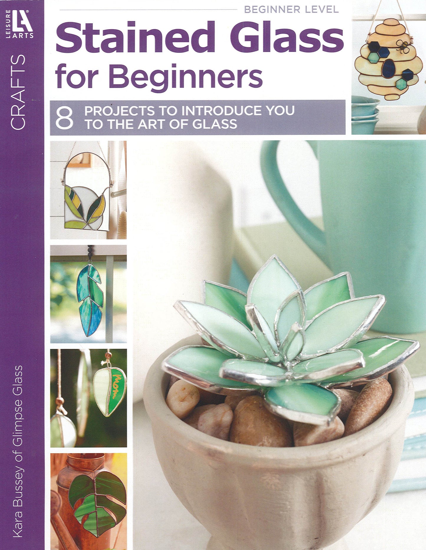 Cover of Stained Glass for Beginners Digital Download by Leisure Arts, featuring beginner stained glass projects like succulents, leaves, and geometric shapes—perfect for anyone starting out in glass art.