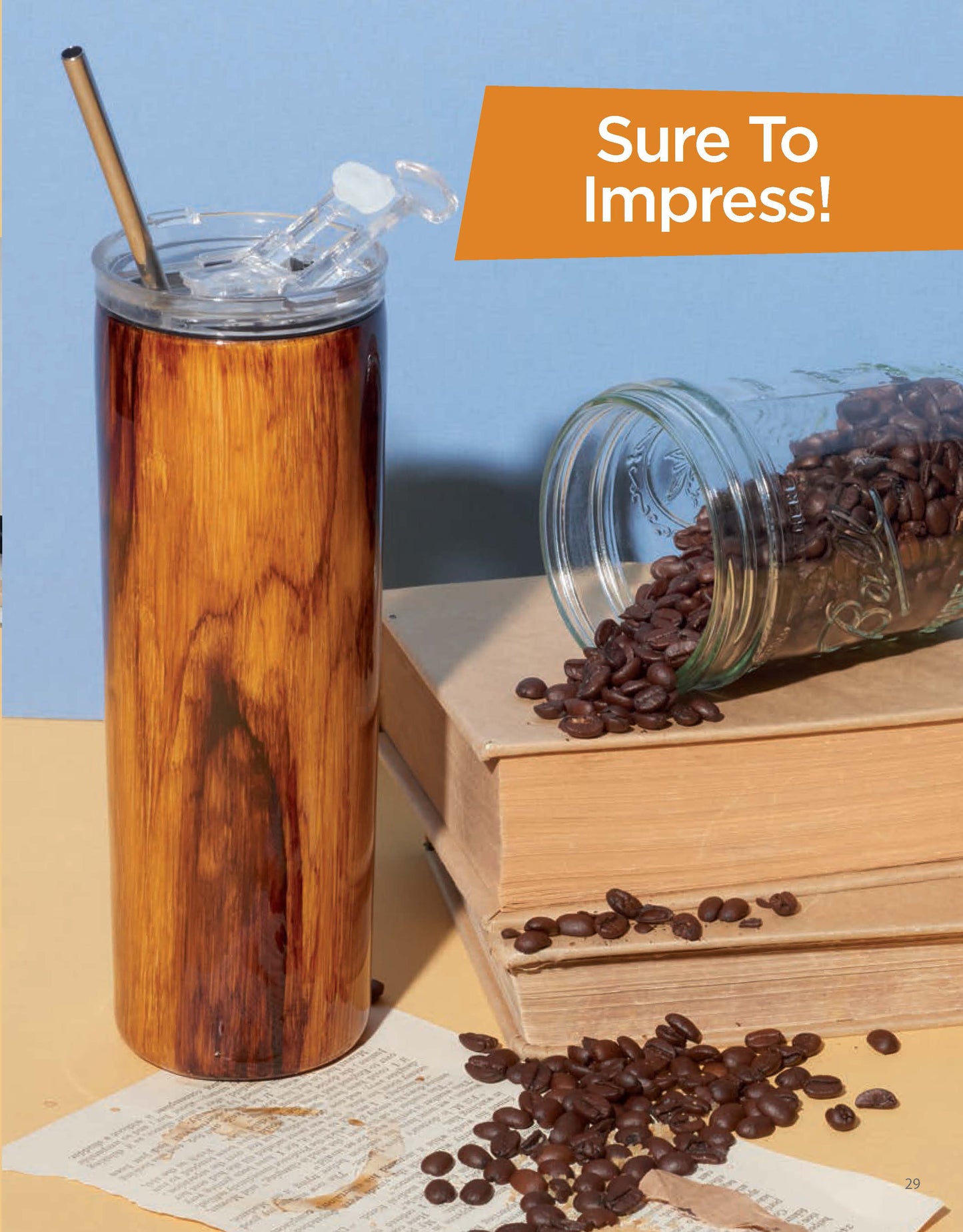 A tall, wood-patterned tumbler with a straw stands on books beside a glass jar spilling coffee beans and a torn book page. Creative designs and an orange banner display "Resin Tumbler Designs Digital Download" by Leisure Arts—sure to impress!.