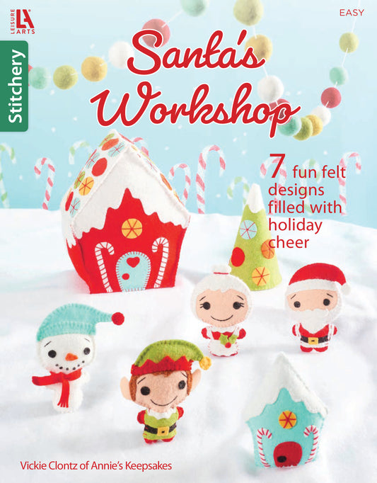 Front cover of Santa's Workshop by Leisure Arts features Christmas felt crafts like Santa, elves, snowmen, and a gingerbread house, with candy canes and DIY holiday decorations in the background.